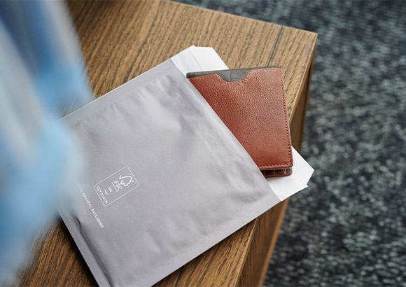 trendhim bubble wrap pouch with brown wallet